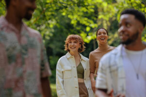 Group of Young Adults Enjoying a Walk in Nature - WorldTone